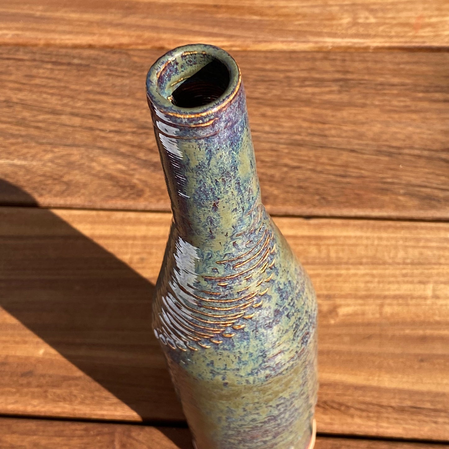 Giving Bottle - Verdant Rivers, Azure and Plum Highlights